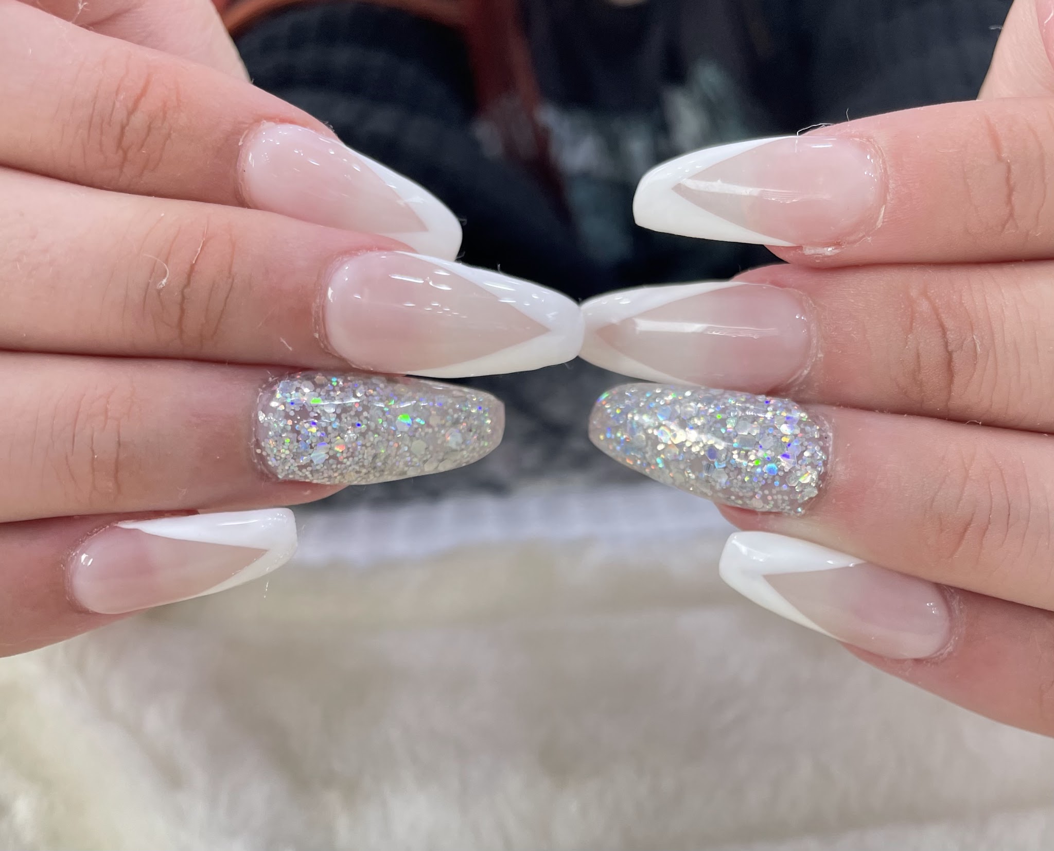 White French tip coffin nails with a holographic glitter accent nail